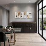 Load image into Gallery viewer, A modern dining room scene featuring a black wooden sideboard with gold handles and a black glass-top dining table with green velvet chairs. Above the sideboard are three abstract gold, white, and black wall art prints.
